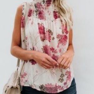 BRAND NEW. Never worn. Rose Smocked Sleeveless Top